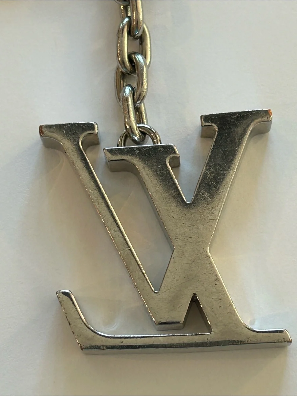 Louis Vuitton Silver Metal LV Logo Keyring Charm